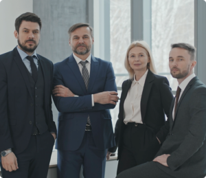 Four attorneys standing together in an office