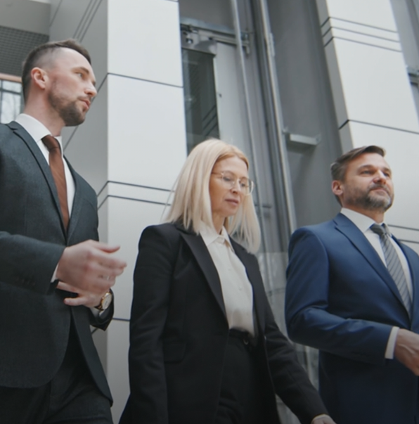 Legal team walking outside corporate office